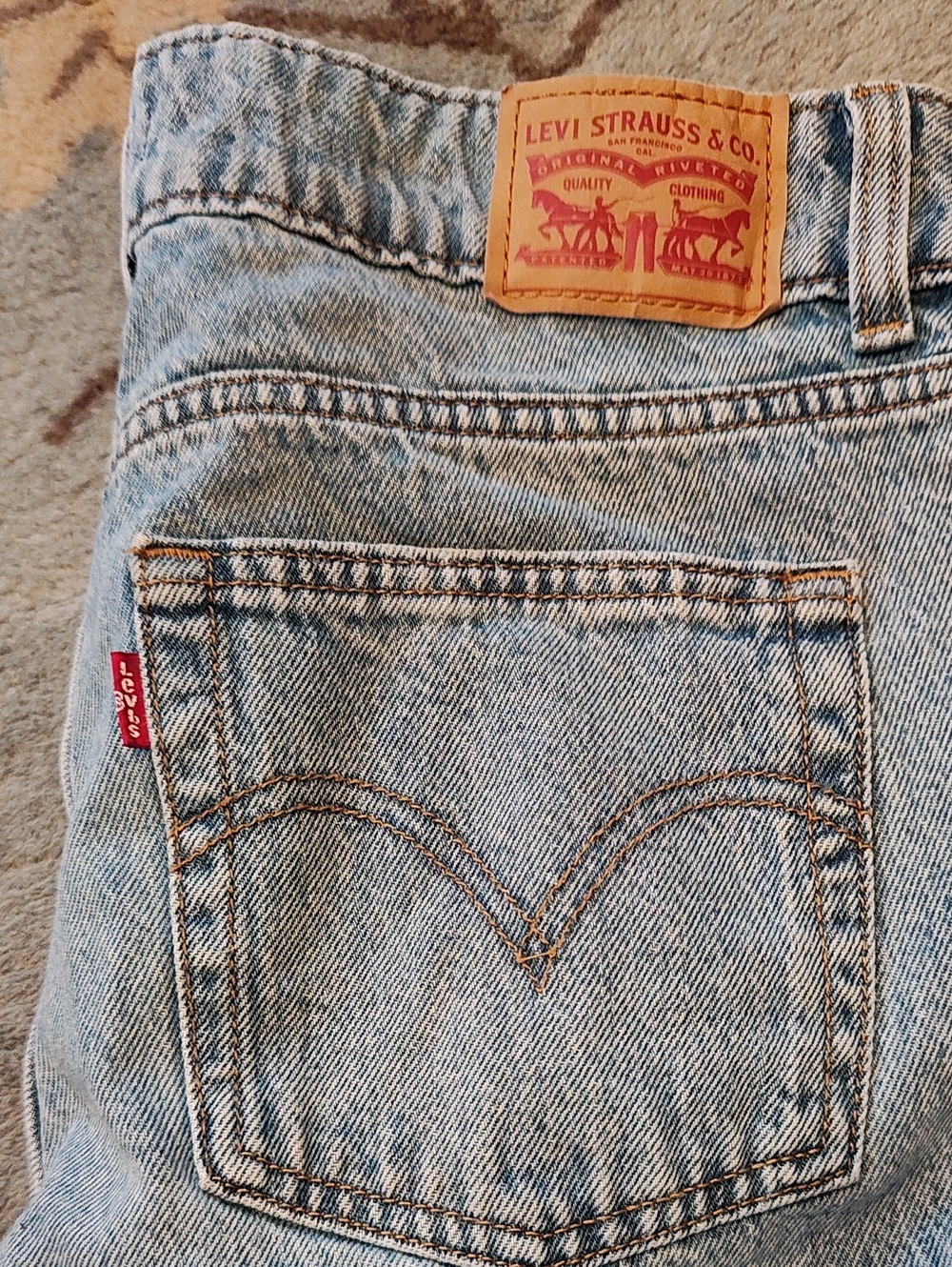 Levi's Women's High-Rise Light Blue Denim Jeans with Leather Patch